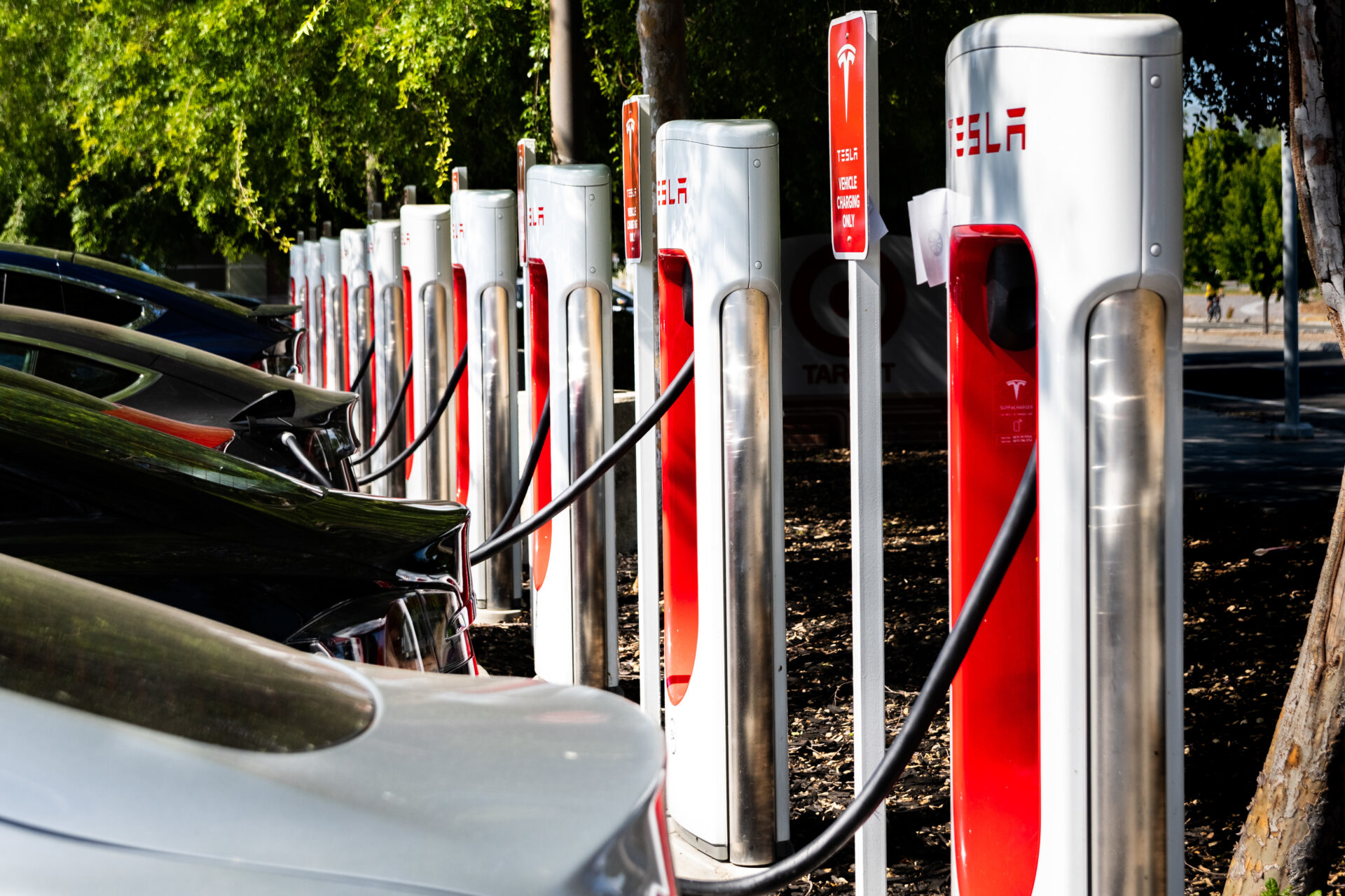 May 5, 2019 San Jose / CA / USA - Tesla vehicles plugged in at a charging station in south San Francisco bay area; Silicon Valley
